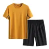 Tweedelige set voor mannen 2021 joggers trainingspak zomer kleding heren t-shirt shorts pak effen kleur plus size mannelijke sportpak 5XL x0610