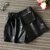 Shorts pour femme Mode femme Taille haute Jambe large 2022 Automne Poches Pantalon court en cuir véritable A821