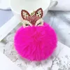 Portachiavi con pompon a forma di palla di pelo di coniglio Adorabile testa di animale Portachiavi con strass di perle per portachiavi con ciondolo per auto da donna