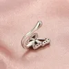 Clip de forme de papillon de mode sur les anneaux de nez étoile faux piercing croisement piercing