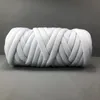 手編みのかぎ針編みの柔らかい大きな綿の毛皮の腕のロービングの回転毛布の巻き毛の毛布の毛羽立ち