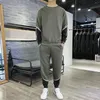 Contailles de survêtement masculines printemps et automne 2022 Fashion coréenne Fashion Loose Sportswear Set Winter Leisure Portez un garçon à l'extérieur