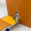 robot Keychains Stainless Steel astronaut Key Holder Brown Necklace Car Key Chain Ring Holder Buckle Keychain Designer Lovers Car Handmade Pendant Accessories