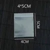 300 teile / los Kleine Ziplock-Schmuck-Selbstversiegelung Kunststoff-Reißverschluss-Taschen transparente PE-Taschen 4x5cm dicke Charms Verpackungstasche