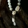 2020 High-End 14K Gold Female Model Hanging Natural Shell Flower Jade Water Drop Bracelet