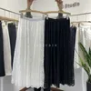 Primavera Verano mujer estilo coreano blanco negro encaje ahueca hacia fuera cintura alta falda larga plisada mujer 210421
