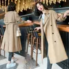 معاطف الخندق النسائية معطف الخريف الطويل الطويل البريطاني 2022 أزياء ملابس تصميم المزاج الكورية