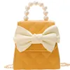 女の子の真珠ハンドバッグダイヤモンド蝶ネクタイ女の子飾り袋子供のチェーン小さな正方形の袋良い売り