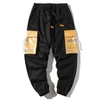 Pantalones de hip hop hombres 2020 nueva moda casual algodón costura color joggers pantalones bolsillo streetwear pantalones hombre 4xl y0927