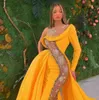 2022 2022 노란색 인어 이브닝 드레스 레이스 스팽글 스팽글 투명한 긴 공식 댄스 파티 가운 오버 스커트 레드 카펫 드레스