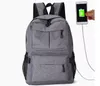 4 цвета 22 дюйма внешнего USB зарядки ноутбук рюкзак анти-кражами ноутбука компьютерная сумка досуг путешествия рюкзак 30 шт.