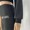 Träningsoveraller för kvinnor Svettdräkter Dam Tvådelat set Lucky Label Ribbing Broderade randiga kläder utanför axeln Träning staplade Leggings