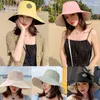 Vrouwen zomercompetities floppy strand zon hoed omkeerbaar zoete madeliefje zonnebloem borduurwerk brede randbeveiliging emmer hoeden