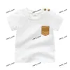 T-shirt à carreaux pour garçons de garçons d'été NOUVEAU NOUVEAU COTTON POCKET CHEPTES CHEURS TE-shirt Baby Round Collar Casual Tops C6993