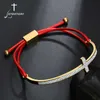 bracelet à cordes rouges avec charme d'or