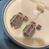 High quality light luxury olivine green jade earrings with purple diamond Tsquare zirconium wind earrings on the side7818324