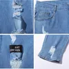 Jeans da uomo Four Seasons Moda giovanile Pantaloni stretti a matita elasticizzata Denim Cotone sfilacciato Lettere sportive Pantaloni Distintivo Y2303