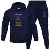 Designer 2021 Sport Heren Merk Trainingspak Lente Herfst Running Hoodie + Broek Sets 2 Stuks Sweatshirt Set Gym kleding Mannen Pak Kleding