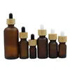 Garrafa do conta-gotas de vidro Bambu Woode LID Portátil Frost Frost Brown Brown Petróleo Versos Recipiente Recarregável 5ml 10ML 15ML 20ML 30ML 50ML 100ML Embalagem Cosmética