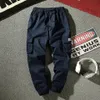 Yaz Ince Tulum Erkek Gevşek Fit Büyük Toe Band Öğrenci Rahat Pantolon Moda Marka Harlan Küçük Bacak Uzun Pantolon Erkekler Çok Cep