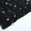 Robe mi-longue noire à imprimé floral et col boutonné à lacets et manches longues en mousseline de soie automne D2027 210514