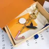 Luksusowy projektant kreki klekowej Moda Klasyczna marka klawisza klamra litera ręcznie robiona złote breloki męskie męskie wisiorka dla kobiet