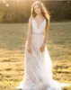 2021 Abiti da sposa in pizzo con ricami Boho per la sposa Una linea Abiti da sposa country Cinghie Abito da fidanzamento senza maniche senza schienale sexy Vestido De Novia