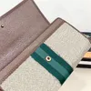 Designer de moda No.557803 sacos multi-cartão carteiras fina design senhora letras luxo carteira famosa bolsa de arte simples saco de embreagem perfurada