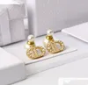 boucles d'oreilles de bijoux de célébrités