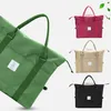 Sacs polochons durables pliants en nylon voyage bagages sac de sport grande capacité femelle emballage Cubes filles week-end pochette sac à main 222E