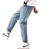 Высококачественные весенние мужские личности напечатаны разорванные джинсы повседневные корейские версии Rhinestone прямые обрезанные брюки размеры 42