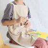 Grembiuli in stile giapponese tinta unita semplice cotone senza pizzo grembiule senza maniche per bambini abito da pittura antivegetativa con tasche per roba