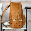 حقيبة حقيبة حقيبة من الجلد MC حقيبة Backpack Backpag Man Designer Schoolbag Fashion Totte Tote Luxury Back Pack for Women Men Clutch Canvas Handbag School Pags