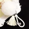 Porte-clés à la mode multicolore boule de cheveux pompon gland pendentif porte-clés porte-clés pour dame femmes sac à main voiture anneau décoration Miri22