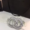 CH CRYSTAL BROOCH DIAMONDMAMN PÅ BAKT HOT Märke smycken lyx avancerade broscher för designer högkvalitativa stift utsökta gåva aaaaa högsta motkvalitet