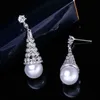 Fashion Hollow Out Design Full Cubic Zirconia Crystal Silver Färg Lång Round Drop Pearl Örhängen för Kvinnor CZ262 210714