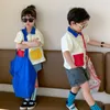 Sommer Jungen Mädchen Shirts der Farbe Matching Nähen Taschen Bunte Knöpfe Lebhafte Kinder Bruder und Schwester Tops 210625