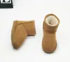 2022 Hot Classic Design Aus Uogs Baby Boy Girl Girl Kids Snow Boots Päls Håll varma Stövlar EUR Cowskin Sheepskin med dammpåse kort Szie EUR 21-34 Gratis omlastning