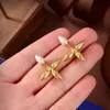 earrings cross
