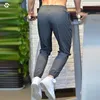 2021 Pantaloni da corsa verde primavera Uomo Sport Jogging Fitness Yoga Allenamento Pallacanestro Calcio Leggings lunghi Elastico ad asciugatura rapida