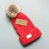 Luxury päls pom poms kid hat mode vinter hattar för barn kepsar baby solid färg designer stickade mössa