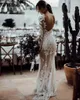 2021 깎아 지른 보헤미안 인어 웨딩 드레스 보석 목 착용 긴 소매 레이스 아첨 크리스탈 비즈 플러스 크기 오픈 비치 Boho Bridal Gowns 스윕 기차