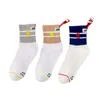 Personality Sewn label pendant casual socks cotton medium tube socks men's and women's sports socks