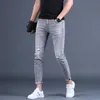 Gros Washing Smoke gris jeans hommes cheville longueur pantalon marque Slim pieds été déchiré trous crayon décontracté coréen 211108