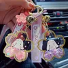 Keychains Creative Cherry Blossoms Keychain Acrylic Moving Liquid Oil Keyring For Women Girl Cute Bag Key Chains Jewelry Gift255r