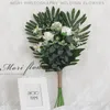 Свадебные цветы Bouquets Bouquets невеста, держащая шелковые цветочные принадлежности
