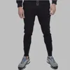 Pantalons pour hommes Joggers pantalons de survêtement course Sport coton maigre gymnases Fitness vêtements de Sport automne pantalon mâle entraînement piste