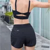 Yoga Outfit Kvinnors Rosa 2 i 1 Running Shorts Gym Sport Andas Byxor Utomhus Övning Snabbtorkning 2021