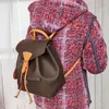 Mochila de cuero genuino de alta calidad Flor vieja Mujer Bolsas de viaje Hombres Mochilas En relieve M45501 Diseñador clásico Doble hombro Bolsa deportiva Bolsos de imitación