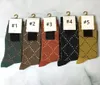 Chaussettes de luxe pour hommes et femmes bas de laine de haute qualité rues seniors confortables chaussettes de genou Designer